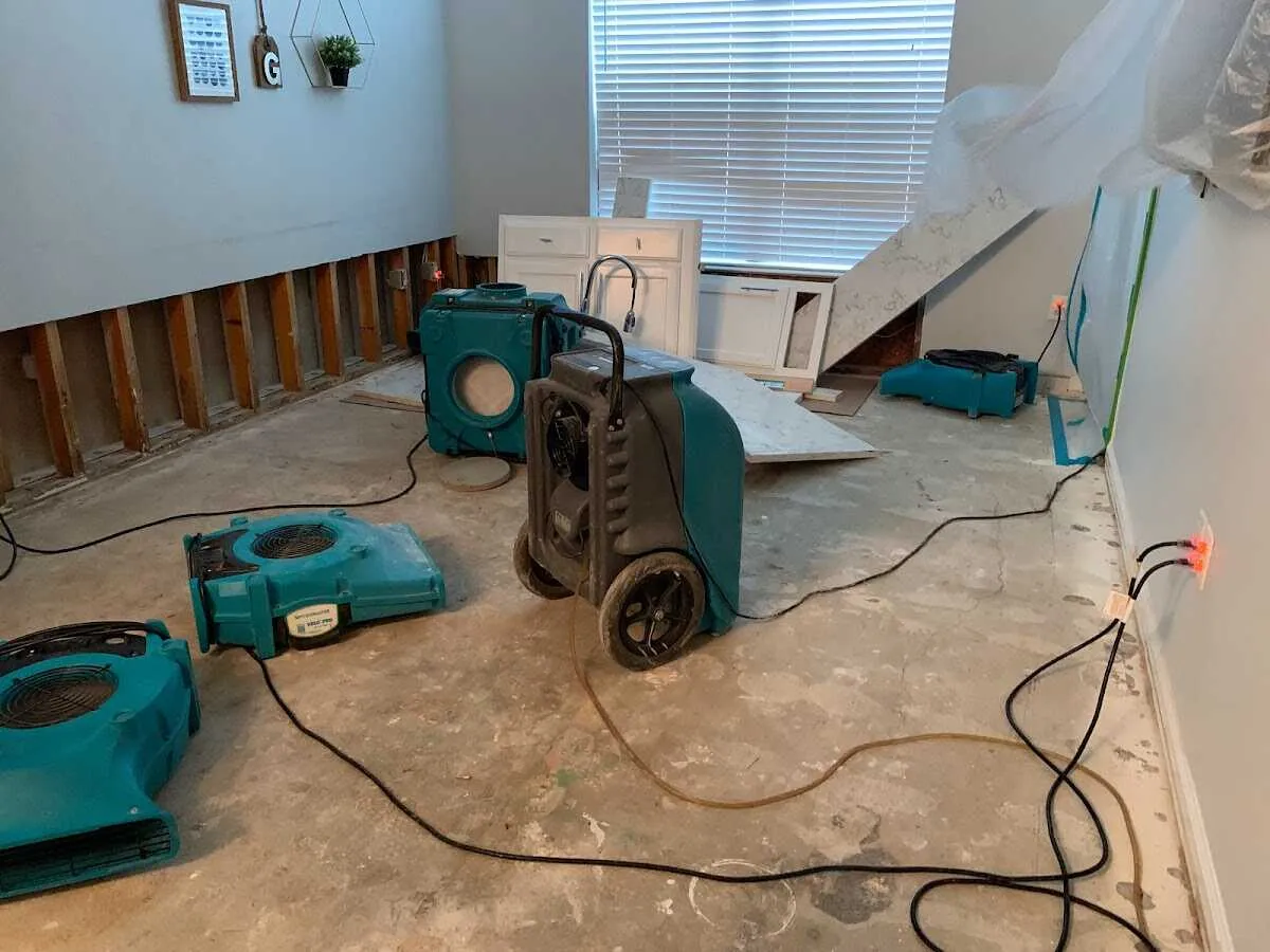 Dehumidifier in flood-cut room for Water Damage Restoration in Orland